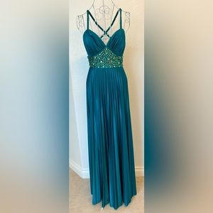 Beautiful dress for prom! Gorgeous beading. Crisscross straps in back.